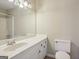 Traditional bathroom features white cabinets, a white sink, and a shower/bath combo at 3863 Meeting St, Duluth, GA 30096