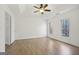 Bright and airy main bedroom featuring wood-look flooring and large windows at 3863 Meeting St, Duluth, GA 30096