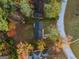 An aerial view capturing a roof and nearby properties amid a lush landscape at 2825 Battlecrest Dr, Decatur, GA 30034