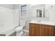 Bathroom featuring a vanity, toilet, and shower-tub combination at 2825 Battlecrest Dr, Decatur, GA 30034