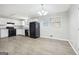 Kitchen with white cabinets, black appliances, and ample lighting at 2825 Battlecrest Dr, Decatur, GA 30034