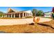 Home exterior with a charming lawn decoration, covered entrance, and a meticulously maintained yard at 242 Kirkley Rd, Tyrone, GA 30290
