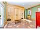 Spacious mudroom featuring built-in storage cabinets, drawers, and convenient bench seating at 242 Kirkley Rd, Tyrone, GA 30290