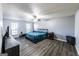 Spacious bedroom features two bright windows, laminate flooring, and ample closet space at 5479 Dorsett Shoals Rd, Douglasville, GA 30135