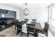 Bright dining room features a dining table with decor and a view to an adjacent living room at 5479 Dorsett Shoals Rd, Douglasville, GA 30135