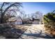 Charming single-Gathering home featuring a well-maintained lawn, mature trees, and an attached two-car garage at 5479 Dorsett Shoals Rd, Douglasville, GA 30135