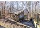Exterior view of the accessory dwelling unit (ADU), highlighting its rustic charm and cozy design at 5479 Dorsett Shoals Rd, Douglasville, GA 30135