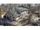 Exterior of the two-story home showing an extensive back yard with a patio and back deck at 5479 Dorsett Shoals Rd, Douglasville, GA 30135