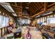Spacious garage interior with exposed wood beams and ample storage space at 5479 Dorsett Shoals Rd, Douglasville, GA 30135