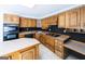 Spacious kitchen featuring ample cabinetry and counter space, ideal for cooking and entertaining at 5479 Dorsett Shoals Rd, Douglasville, GA 30135