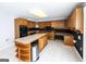 Well-equipped kitchen with a center island, offering plenty of room for meal preparation and storage at 5479 Dorsett Shoals Rd, Douglasville, GA 30135