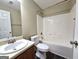 Clean bathroom with tub, toilet and vanity at 567 Hansen Dr, Locust Grove, GA 30248