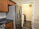 Convenient laundry room located just off the kitchen at 567 Hansen Dr, Locust Grove, GA 30248