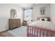 Charming bedroom with a pink bed frame, playful decor, and natural light creating a cozy and inviting space at 11517 Kimberly Way # 3, Hampton, GA 30228