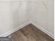 Corner of a closet with wire shelving and wood-look flooring at 11517 Kimberly Way # 3, Hampton, GA 30228