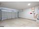 Bright and spacious two car garage with light gray door at 11567 Kimberly Way # 25, Hampton, GA 30228