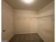 Walk-in closet with wire shelving at 306 Blackfoot Trl, Villa Rica, GA 30180