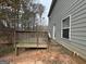 Wooden deck overlooks a wooded area at 306 Blackfoot Trl, Villa Rica, GA 30180