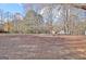 Wide angle view of a leaf covered backyard at 435 Crabapple Rd, Fayetteville, GA 30215