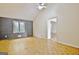 Spacious living room with vaulted ceilings, wood paneled accent wall, and natural light at 435 Crabapple Rd, Fayetteville, GA 30215