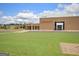 Exterior view of Whitewater High School with well-manicured lawn at 435 Crabapple Rd, Fayetteville, GA 30215