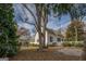 The expansive backyard includes mature trees and offers ample space for outdoor activities at 3810 2Nd Ave, Mansfield, GA 30055