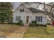 Charming two-story home with neat landscaping, walkway, shutters and attractive curb appeal at 3810 2Nd Ave, Mansfield, GA 30055