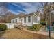The exterior features well-maintained siding, a wheelchair ramp, and a spacious yard at 3810 2Nd Ave, Mansfield, GA 30055