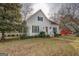 Charming two-story home featuring a landscaped front yard and classic architectural details at 3810 2Nd Ave, Mansfield, GA 30055