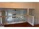 View from above of a spacious living room with tile flooring, fireplace, and vaulted ceiling at 7472 Woods Ct, Lithonia, GA 30058