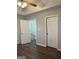 This bedroom offers great closet space and features a ceiling fan and laminate flooring at 251 Ralph David Abernathy Sw Blvd, Atlanta, GA 30312