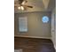 Bedroom has laminate floors, a ceiling fan, natural light from the window, and closet at 251 Ralph David Abernathy Sw Blvd, Atlanta, GA 30312