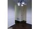 Dining room with modern chandelier and hardwood floors at 251 Ralph David Abernathy Sw Blvd, Atlanta, GA 30312