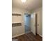 This storage area features new laminate floors, neutral walls, and access to storage at 251 Ralph David Abernathy Sw Blvd, Atlanta, GA 30312