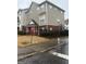 Exterior view highlighting a multi-unit building with brick accents, landscape, and street access at 251 Ralph David Abernathy Sw Blvd, Atlanta, GA 30312