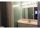 Clean bathroom with vanity and large mirror at 2744 Amber Springs Way, Buford, GA 30519