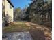 Expansive backyard with mature trees offering plenty of space for recreation and outdoor activities at 80 Tanners Ct, Covington, GA 30016