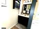 Modern bathroom featuring a dark vanity with storage and a framed mirror at 80 Tanners Ct, Covington, GA 30016