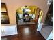 Dining room view from archway features a chandelier and seating for six at 80 Tanners Ct, Covington, GA 30016
