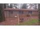 Backyard view featuring brick exterior of home and a swing set at 3603 Manhattan Dr, Decatur, GA 30034