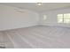 Spacious bonus room with grey carpet and neutral walls at 3278 Greenhill Dr, Villa Rica, GA 30180