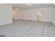 Large bonus room featuring carpet and access to bathroom at 3278 Greenhill Dr, Villa Rica, GA 30180