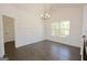 Bright dining room with hardwood floors and wainscoting at 3278 Greenhill Dr, Villa Rica, GA 30180