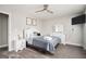 Bedroom with a queen-size bed and white dresser at 8816 Ashwood Dr, Riverdale, GA 30274