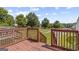 Back deck with steps down to a fenced yard at 103 Odyssey Turn, Conyers, GA 30012