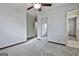 Bright bedroom with mirrored closet and carpet at 6063 Cristie Dr, Ellenwood, GA 30294