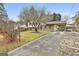 House front view with driveway and landscaping at 6063 Cristie Dr, Ellenwood, GA 30294