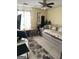 Versatile bedroom space with large windows and neutral decor at 3722 Lockerbie Ln, Powder Springs, GA 30127