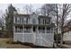 Charming two-story home featuring a spacious front porch and classic architectural details at 3722 Lockerbie Ln, Powder Springs, GA 30127