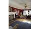 Comfortable living room featuring a beautiful fireplace and hardwood floors at 3722 Lockerbie Ln, Powder Springs, GA 30127